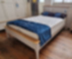 Painted wooden bedstead