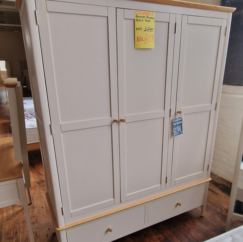 Painted hinged wardrobes at pear mill beds warehouse store